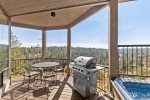 Panoramic river views from deck with hot tub, barbeque grill with propane, patio seating for four